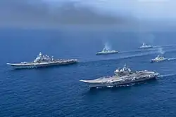 Vikrant and Vikramaditya with two Kolkata-class destroyer and a Talwar-class frigate