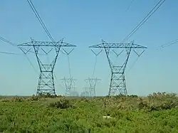 Southern California Edison's two 500 kV as they cross Interstate 5. Pacific Gas & Electric's in the distant background.
