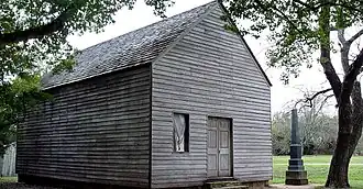 Replica of Independence Hall, where the Texas Declaration of Independence was signed. The inscription reads: "Here a Nation was born."