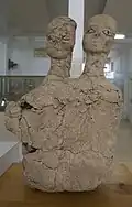 Plaster statues of two humans, Ayn Ghazal. Jordan Archaeological Museum.