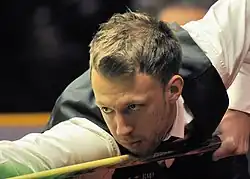 picture of Judd Trump at a snooker table