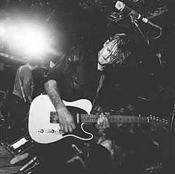 Shekoski performing in 2014