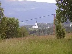 A picture of Kalls Kyrka from the neighbouring village of Sölvsved