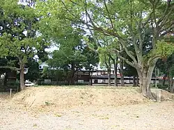 A low earthen platform.