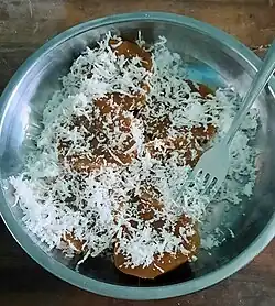 Pitsi-pitsi a dessert made from cassava, topped with grated coconut.