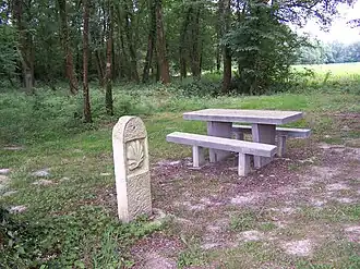 Boundary stone with St James shell in Labastide-Chalosse
