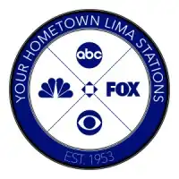 A roundel with a middle part divided in four containing the logos of (from top, clockwise) ABC, Fox, CBS, and NBC. Around them is a blue ring reading "Your Hometown Lima Stations" up top and "Est. 1953" in a thinner typeface at the bottom.