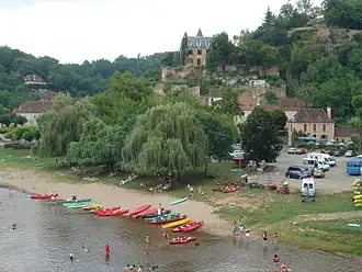Canoes on the bank of the Dordogne river in Limeuil