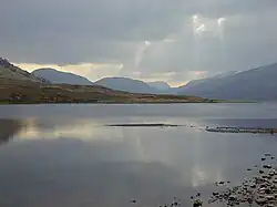 With the Fisherfield hills in the distance.
