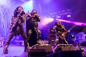 Lordi performing in 2025 (L–R): Hiisi, Mr Lordi, Kone