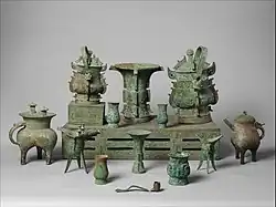 Altar set; late 11th century BC; bronze; overall (table): height: 18.1 cm (71⁄8 in.), width: 46.4 cm (181⁄4 in.), depth: 89.9 cm (353⁄8 in.); Metropolitan Museum of Art (New York City, U.S.)