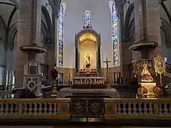 The cathedra, newer high altar, pulpit, altar rail, and the ciborium