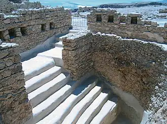 Stepped pool interpreted by Yadin as a Herodian swimming pool, possibly used as a public ritual immersion bath (mikveh) by the rebels (#17 on plan)[45][46]