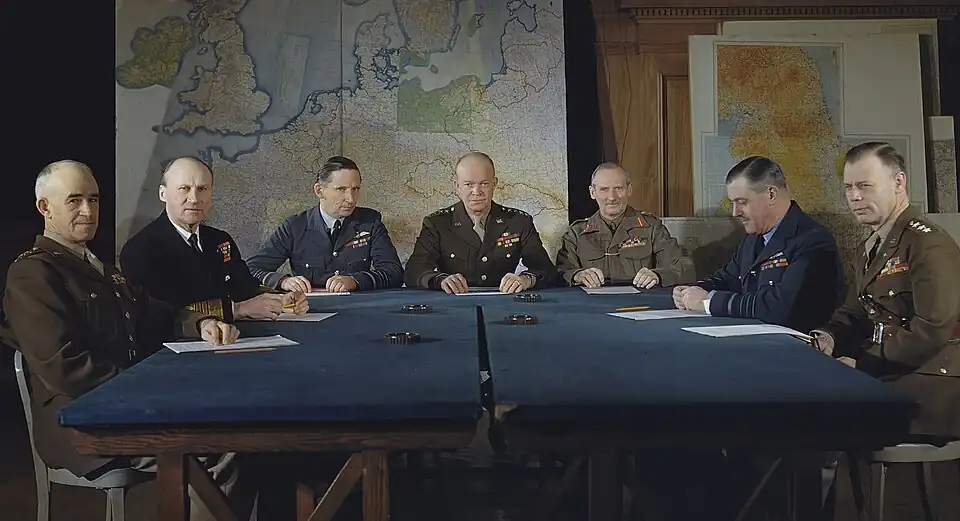 Supreme Command, Allied Expeditionary Force (SHAEF), London, 1 February 1944. Tedder sits to the right of Eisenhower as Deputy Supreme Allied Commander