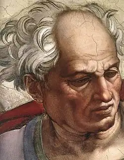 A close-up of the face of the central figure