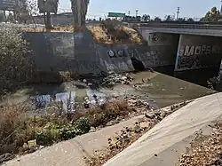 After merge with Miguelita Creek, into the culvert under US 101