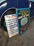 Some of the many promotional noticeboards used by Moss to promote their coach tours.