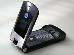Flip phones (such as the Motorola Razr V3i pictured here) and keyboard phones were commonplace throughout the 2000s, like BlackBerry and Motorola phones. By the very late 2000s and mostly 2010s, bar-shaped full-touchscreen smartphones had replaced flip-phones and keyboard phones.