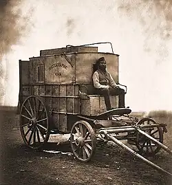 Image 41Roger Fenton's Photographic Van, 1855, formerly a wine merchant's wagon; his assistant is pictured at the front. (from Photojournalism)