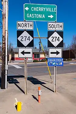 Directional signs of NC&nbsp;274, at the end of NC&nbsp;161, in Bessemer&nbsp;City