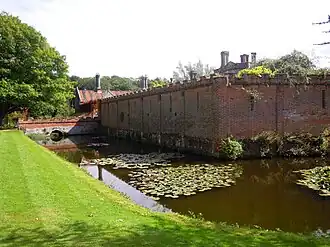 The north west corner of the hall's boundary wall.