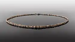 Necklace made of cut-off chips and low-quality rough diamonds