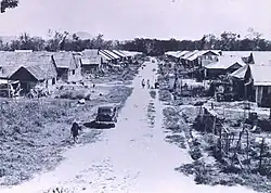 A model new village, designed as part of the Briggs Plan to separate the largely Chinese Malaysian rural populace from communist guerrillas during the Malayan Emergency (1948–1960)