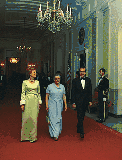 President Richard Nixon, First Lady Pat Nixon and Israeli Prime Minister Golda Meir walk to the State Dining Room prior to a state dinner, 1973