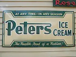 Old advertisement on the side of the former Narracan General Store at Old Gippstown, Moe