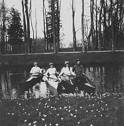 The tsar Nicholas II and three of his daughters canoeing in the Alexander park, May 1913