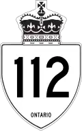 Highway 112 marker