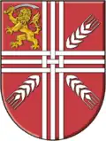A cross triple parted fretted in the municipal coat of arms of Nova Crnja (Serbia)