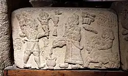 Hittite king offering libation to a Storm god, orthostat from Malatya (12th century BCE)