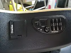 An Ovation Celebrity's on-board electronics (Electronic tuner and preamplifier)