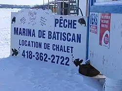Sign on the river ice path, access from the Marina
