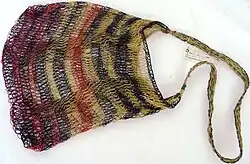 A bilum bag, used in Papua New Guinea. Bilums are made of "bush rope", cuscus fur or wool, and expand in size
