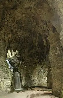 A gallery of the former quarry has been transformed into a grotto with a 20-meter high artificial waterfall.