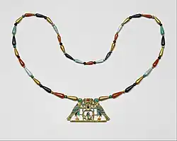 Pectoral and necklace of Princess Sithathoriunet; 1887–1813&nbsp;BC; gold, carnelian, lapis lazuli, turquoise, garnet & feldspar; height of the pectoral: 4.5&nbsp;cm; Metropolitan Museum of Art