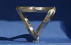 Real Penrose Triangle, Stainless Steel, by W.A.Stanggaßinger, Wasserburg am Inn, Germany. This type of impossible triangle was first created in 1969 by the Soviet kinetic artist Vyacheslav Koleichuk.[11]