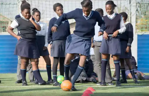Adolescents in South Africa participate in a Grassroot Soccer SKILLZ activity.