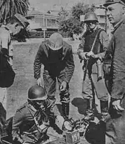 Image 12Police inspection the sewers in Montevideo, which were used by MLN-T members to move around the city. (from History of Uruguay)