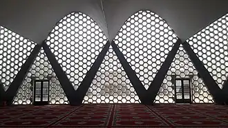 View from within the prayer hall of Jean-François Zevaco's 1966 Assuna Mosque, inspired by Niemeyer's 1943 Igreja da Pampulha.[7]
