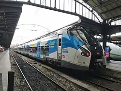 Régiolis in "Fluo Grand Est" livery at Paris-Est.