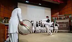 Baloch people performing a dance at the Zabol University