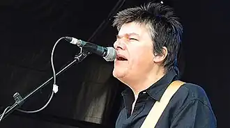 The lead singer appearing live in concert in 2014.