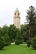 The Clock Tower within the park surrounding it.