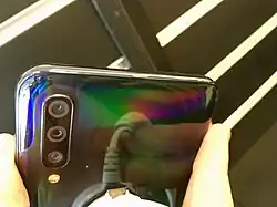 Smartphone with iridescent back panel