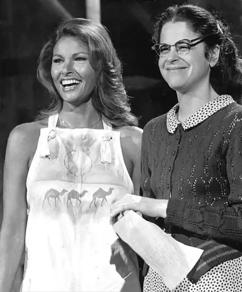 Radner, as Emily Litella, with Raquel Welch