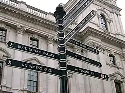 Image 25A signpost on Parliament Square with directions for nearby attractions (from Tourism in London)