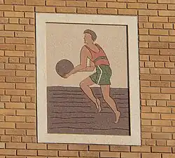 Terra cotta image of a basketball player